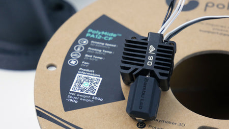 E3D DiamondBack ホットエンドを取り付けたBambu Labツールヘッドと、Polymaker PolyMide PA12-CF（カーボン配合ナイロン）のスプール